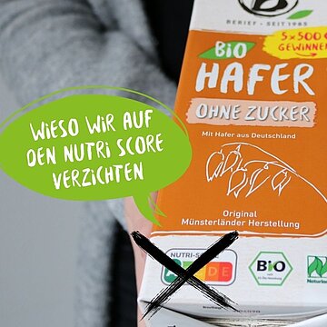 Wieso wir auf den Nutriscore verzichten Ein Foto eines Hafergetränkekartons, auf dem die Angaben von Nutriscore durchgestrichen sind.
